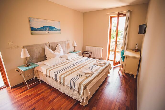 Imagen de la habitación del Hotel Hullám Villa. Foto 20