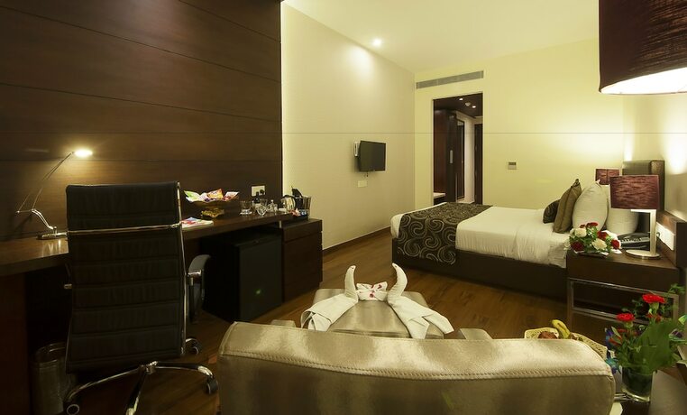 Imagen de la habitación del Hotel Humble Amritsar. Foto 18
