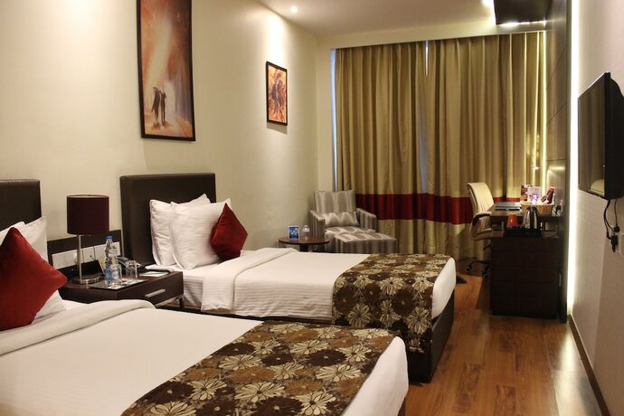 Imagen de la habitación del Hotel Humble Amritsar. Foto 19