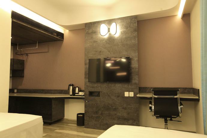 Imagen de la habitación del Hotel Humming Bird and Banquet. Foto 3