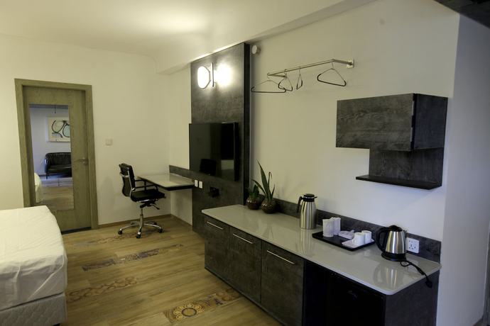 Imagen de la habitación del Hotel Humming Bird and Banquet. Foto 8