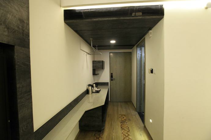 Imagen de la habitación del Hotel Humming Bird and Banquet. Foto 10