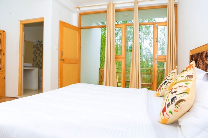 Imagen de la habitación del Hotel Hunder Resort. Foto 11