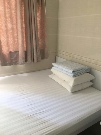 Imagen de la habitación del Hotel Hung Kiu Guest House. Foto 11