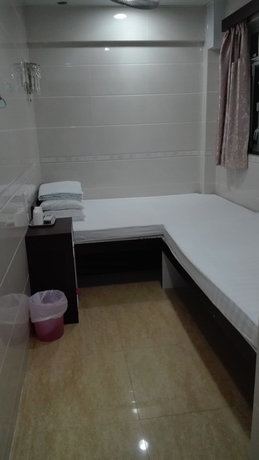 Imagen de la habitación del Hotel Hung Kiu Guest House. Foto 12