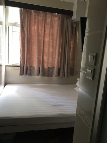 Imagen de la habitación del Hotel Hung Kiu Guest House. Foto 13