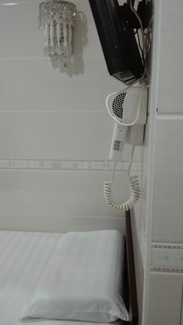 Imagen de la habitación del Hotel Hung Kiu Guest House. Foto 15
