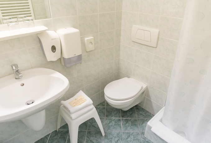 Imagen de la habitación del Hotel Hunguest Helios. Foto 11