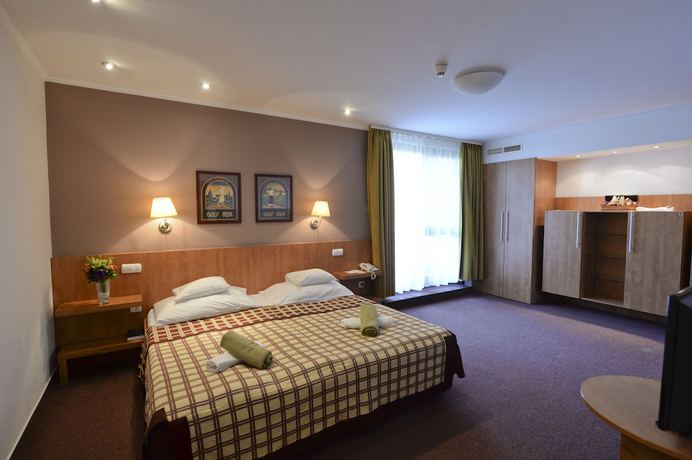 Imagen de la habitación del Hotel Hunguest Pelion. Foto 7