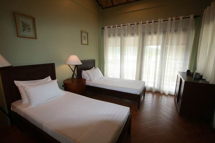 Imagen de la habitación del Hotel Hunongan Cove. Foto 17