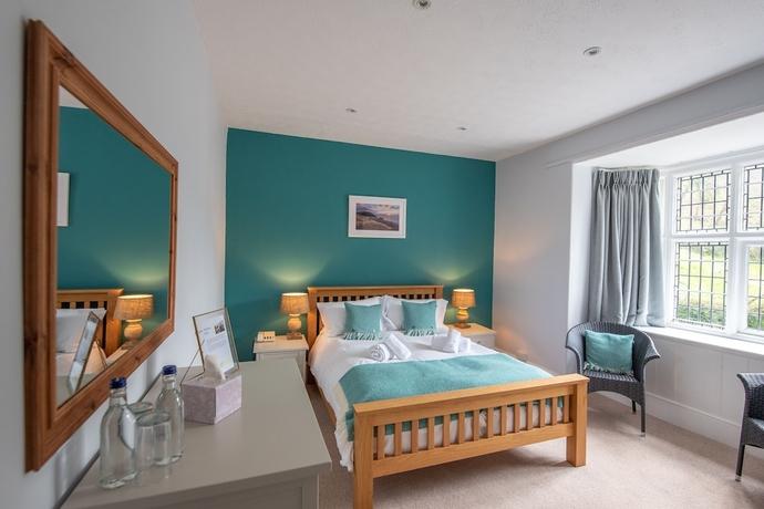 Imagen de la habitación del Hotel Hunter\'s Inn. Foto 2