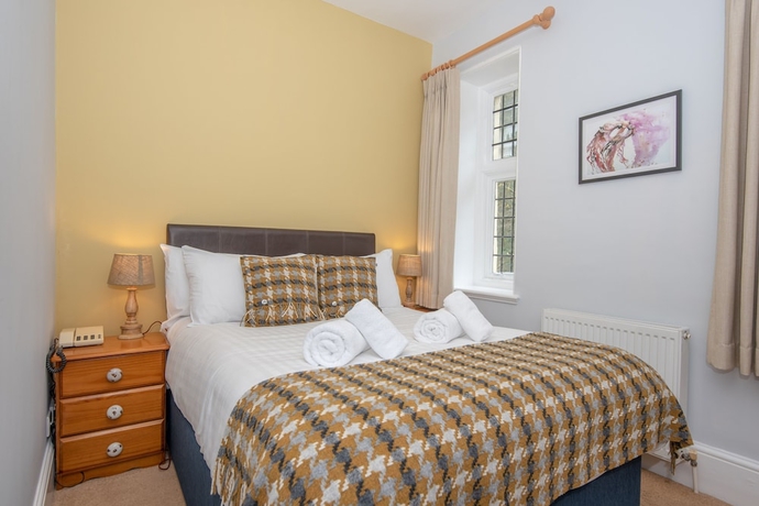 Imagen de la habitación del Hotel Hunter\'s Inn. Foto 4