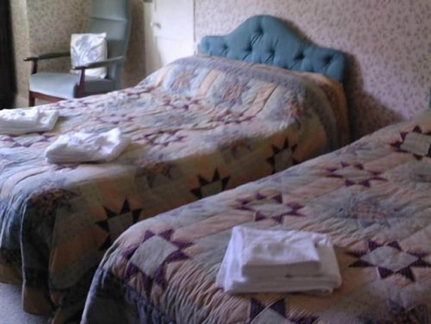 Imagen de la habitación del Hotel Hunter\'s Inn. Foto 9