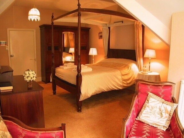 Imagen de la habitación del Hotel Hunter\'s Inn. Foto 11