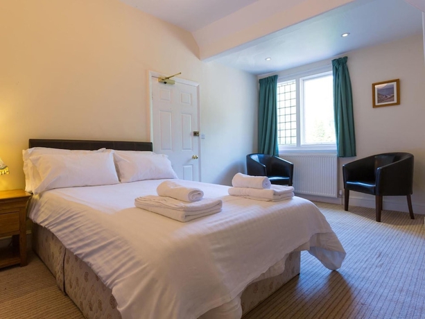 Imagen de la habitación del Hotel Hunter\'s Inn. Foto 19