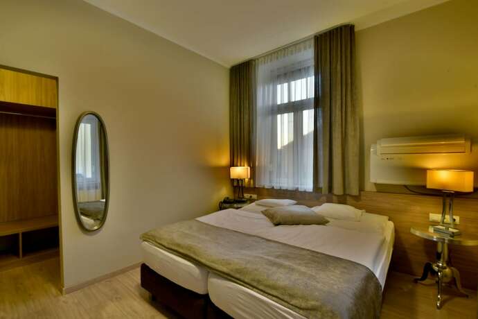 Imagen de la habitación del Hotel Hunyadi, Gyor. Foto 18