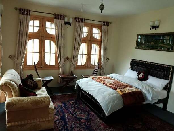 Imagen de la habitación del Hotel Hunza Blossom Inn. Foto 11