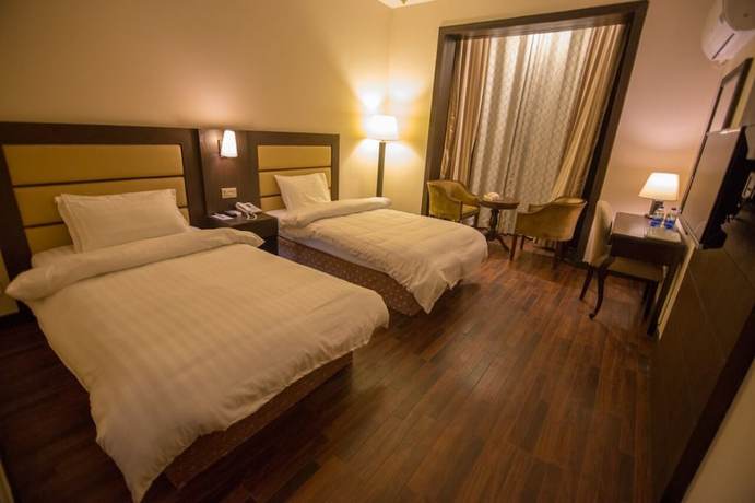 Imagen de la habitación del Hotel Hunza Darbar. Foto 4
