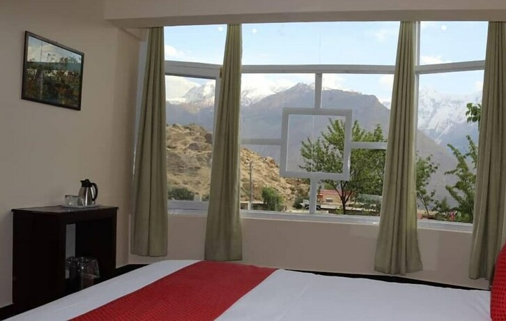 Imagen de la habitación del Hotel Hunza Roof. Foto 19