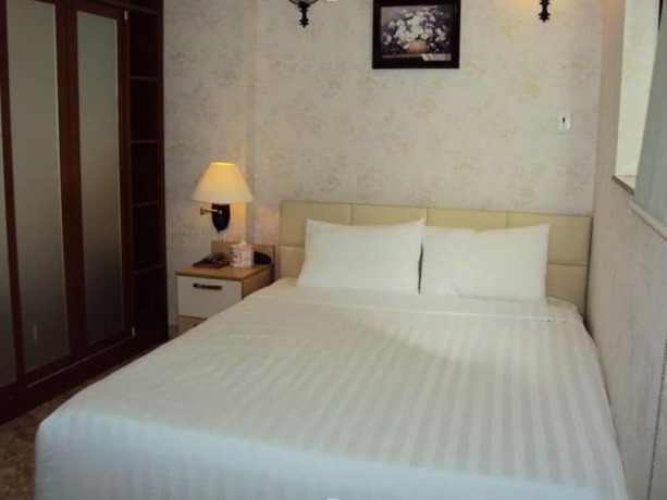 Imagen de la habitación del Hotel Huong Trinh. Foto 4