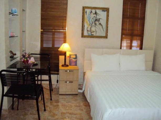 Imagen de la habitación del Hotel Huong Trinh. Foto 11