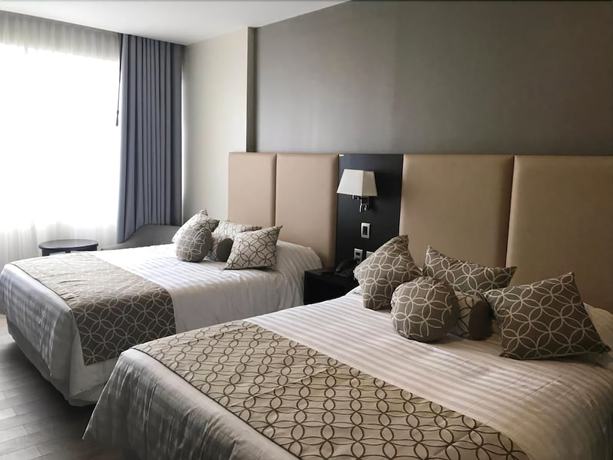 Imagen de la habitación del Hotel Huper Boutique. Foto 9