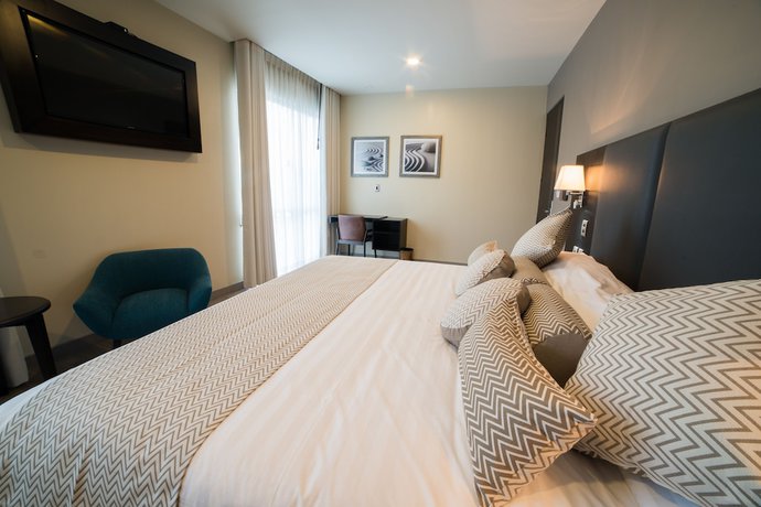 Imagen de la habitación del Hotel Huper Boutique. Foto 12