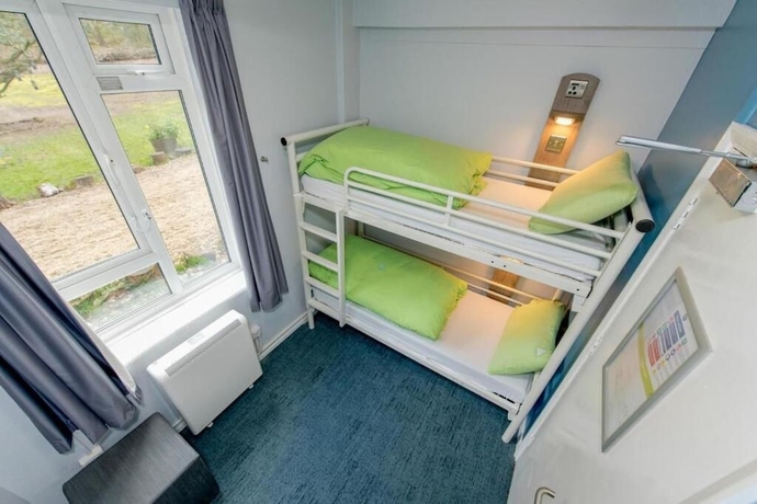 Imagen de la habitación del Hotel Hurtwood Hideout. Foto 10