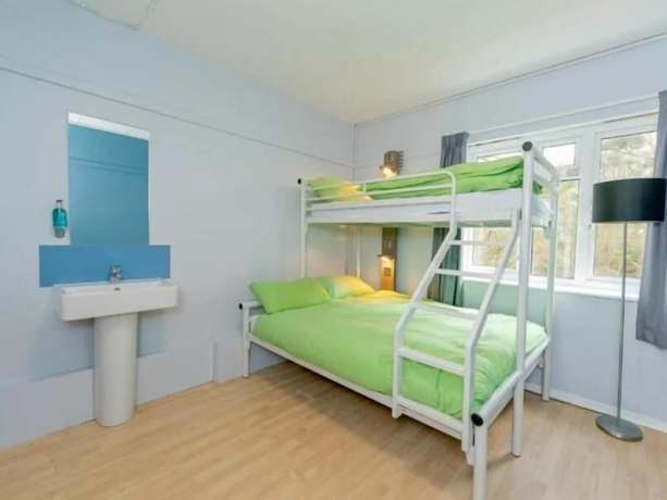 Imagen de la habitación del Hotel Hurtwood Hideout. Foto 11
