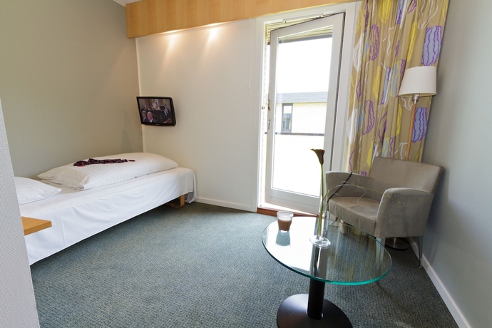 Imagen de la habitación del Hotel Huset Middelfart. Foto 12