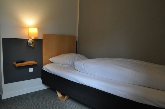 Imagen de la habitación del Hotel Huset Middelfart. Foto 14