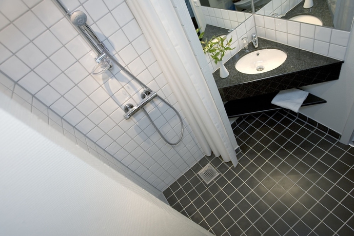 Imagen de la habitación del Hotel Huset Middelfart. Foto 15