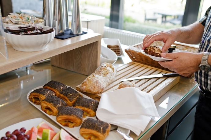 Imagen del bar/restaurante del Hotel Huset Middelfart. Foto 5