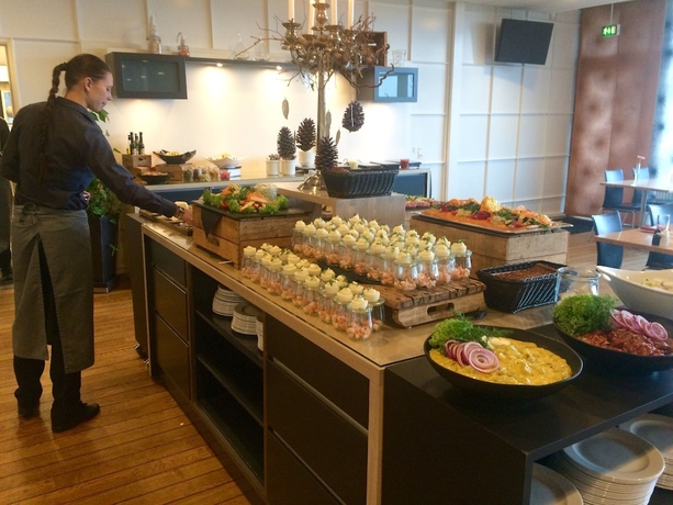 Imagen del bar/restaurante del Hotel Huset Middelfart. Foto 11