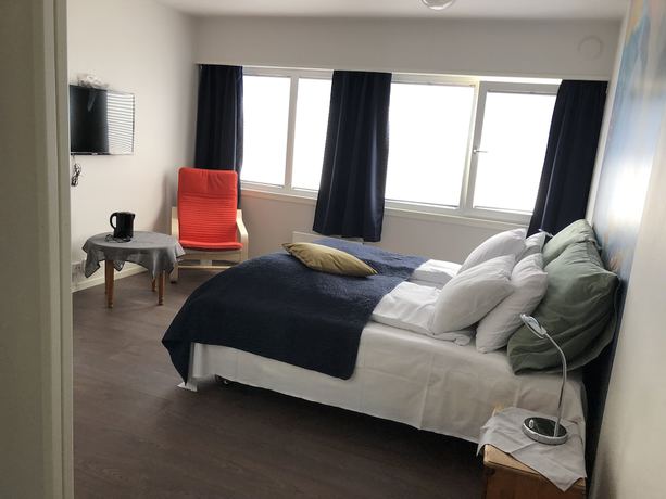 Imagen de la habitación del Hotel Husnes Sentruml. Foto 4