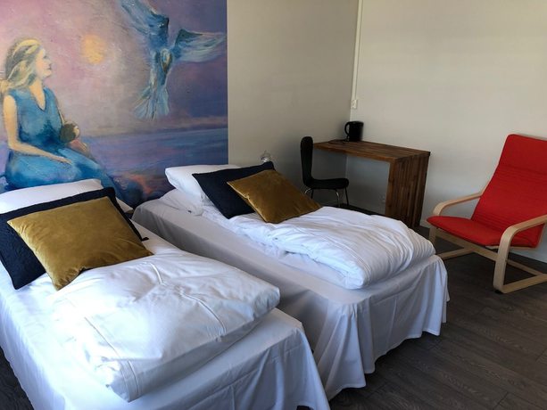 Imagen de la habitación del Hotel Husnes Sentruml. Foto 9
