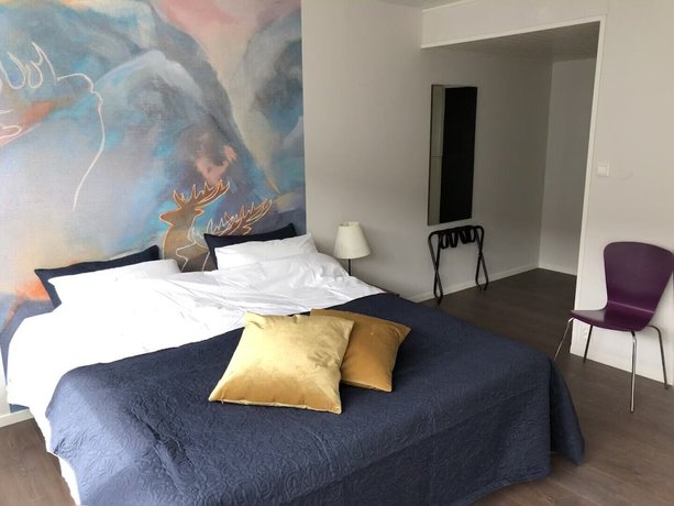 Imagen de la habitación del Hotel Husnes Sentruml. Foto 10