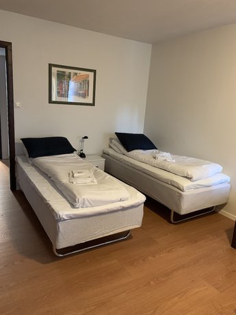 Imagen de la habitación del Hotel Husnes Sentruml. Foto 11