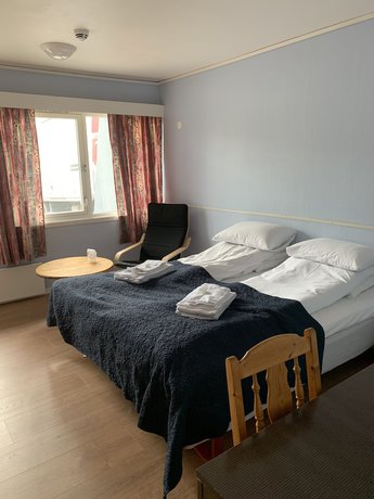 Imagen de la habitación del Hotel Husnes Sentruml. Foto 13
