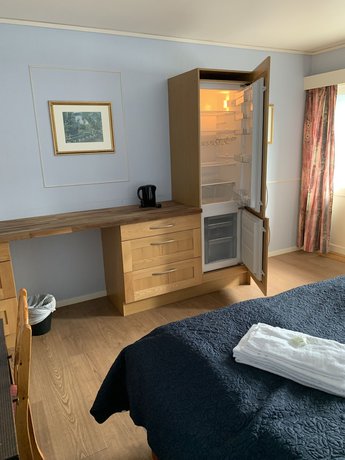 Imagen de la habitación del Hotel Husnes Sentruml. Foto 14