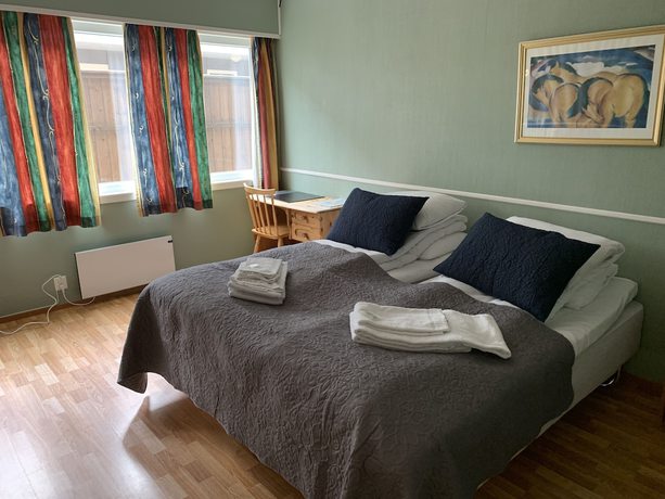 Imagen de la habitación del Hotel Husnes Sentruml. Foto 17