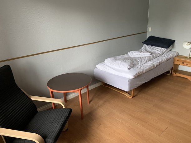 Imagen de la habitación del Hotel Husnes Sentruml. Foto 18