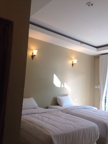 Imagen de la habitación del Hotel Hut Sun Bungalow. Foto 3