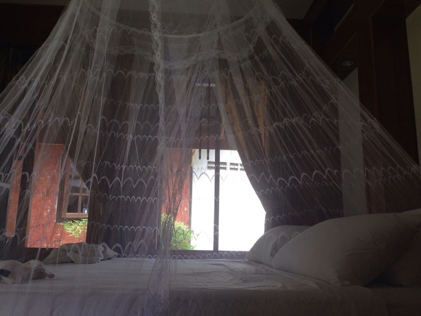 Imagen de la habitación del Hotel Hut Sun Bungalow. Foto 4