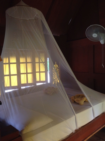 Imagen de la habitación del Hotel Hut Sun Bungalow. Foto 7