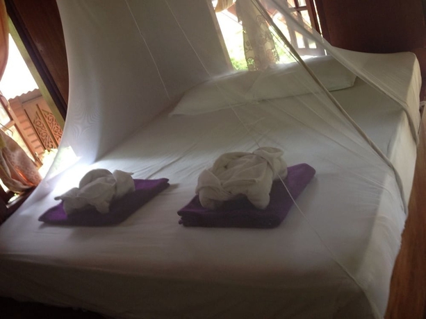 Imagen de la habitación del Hotel Hut Sun Bungalow. Foto 15