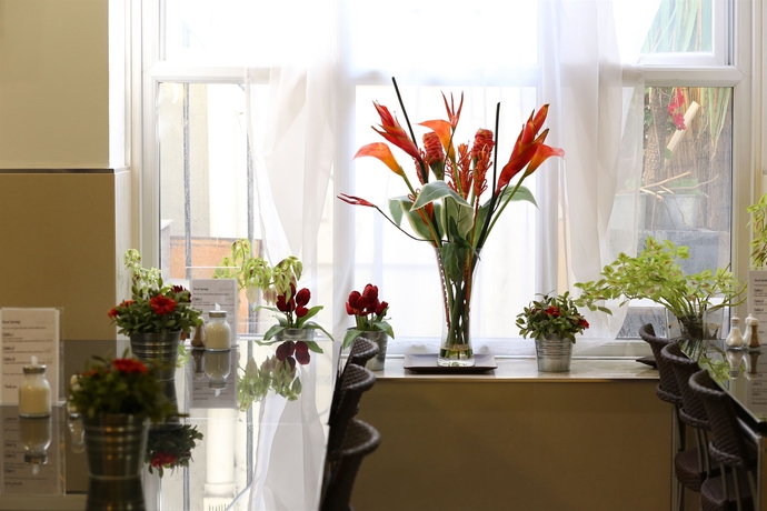 Imagen del bar/restaurante del Hotel Huttons. Foto 8