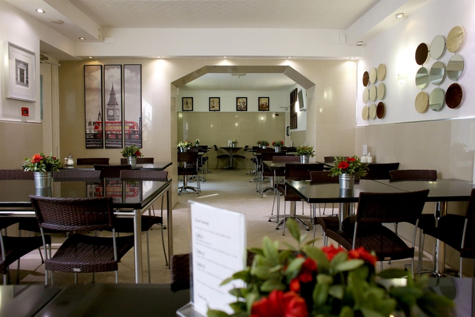 Imagen del bar/restaurante del Hotel Huttons. Foto 9