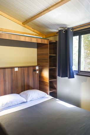 Imagen de la habitación del Hotel Huttopia Fontvieille. Foto 10