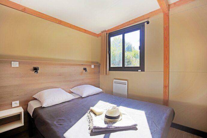 Imagen de la habitación del Hotel Huttopia Les Chateaux, BRACIEUX. Foto 13